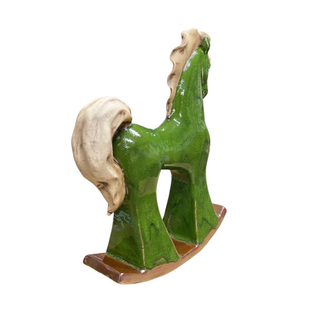 Koń zielony na biegunach